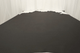 Picture of a charcoal grey Italian upholstery leather displayed on a table