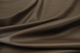 Close up picture of rich dark brown Italian leather for upholstery