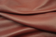 Close up picture of deep warm red full grain leather for upholstery
