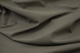 Close up picture of warm dark grey Italian leather for upholstery
