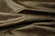 Close up picture of dark brown pull up upholstery leather