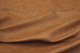 Close up picture of multitone gold Italian upholstery leather
