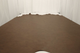 Picture of multitone oak brown semi-aniline leather for upholstery displayed on a table
