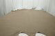 Picture of multitone distressed taupe semi-aniline leather for upholstery displayed on a table