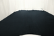 Picture of deep navy semi-aniline upholstery leather displayed on a table