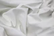 Close-up picture of Polar White, white leather fabric for seats, sofas and other furniture upholstery 