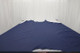 Picture of Cobalt, bright blue colored leather hide for upholstery displayed on a table