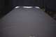 Picture of Charcoal, real dark grey leather hide for upholstery displayed on a table
