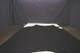 Black Beauty soft, nappa leather hide for upholstery displayed on a table 