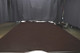 Picture of Restoration Espresso full grain leather hide for upholstery displayed on a table