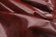 Picture of draping Bordeaux Distress pull-up leather from Italy for upholstery and furniture