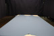 Picture of draping Island Sky, blue cowhide leather for upholstery and furniture.