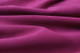 Picture draping fuchsia pink suede fabric for use in apparel