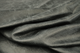 Close up picture of cool grey/black pull up upholstery leather