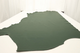 Picture of emerald green nappa like leather for upholstery displayed on a table