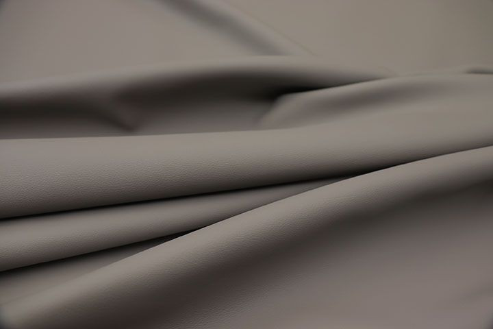 Close-up picture of Cloud Nine soft medium grey leather for upholstery with natural grain texture.