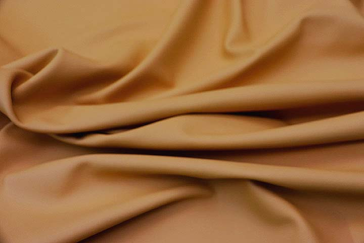 Picture of Audubon Gold, smooth leather for upholstery showing smooth grain.