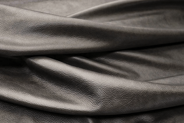 Closeup picture of Alley Cat soft, dark grey colored upholstery leather for furniture