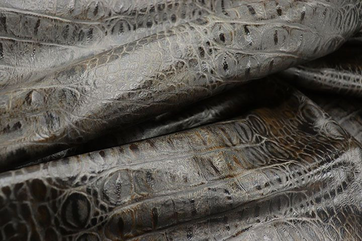 Picture of Smooth Smoky Black Croc, black embossed leather with croc print showing scales and grain.  