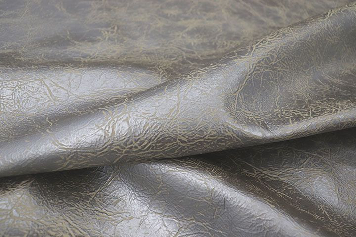 Close up picture of Silver Symphony, two-tone leather with a distress effect and natural grain texture.