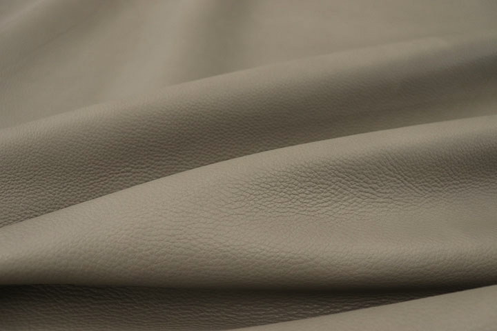 Close up picture of medium grey aniline leather for upholstery