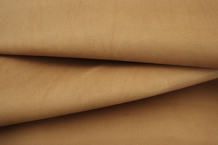 Close up of cross hatch veg tanned leather for crafting
