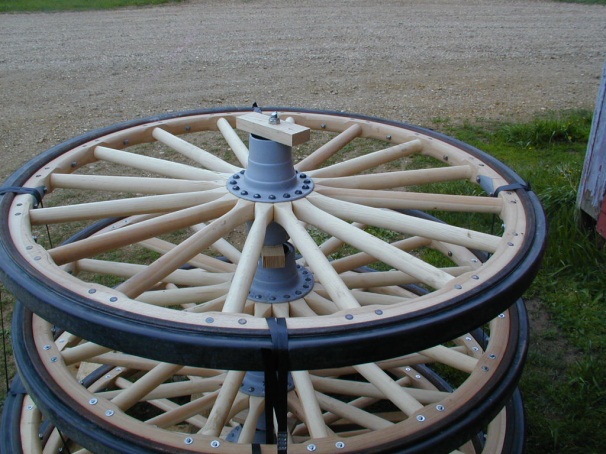Stack of wooden wheels with rubber tiring