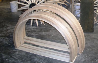 Steam bent felloes over bent