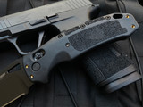 Hogue Sig K320 Nitron Manual Folder Black Polymer Handle w/ Drop Point S30V Black Cerakote Drop Point Blade (3.5”) 36370