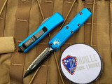 Microtech UTX-85 D/E Blue Aluminum Body w/ Black Full Serrated Blade (3.11”) 232-3BL