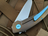 Hog House Knives Model T Bronzed Titanium Body w/ Light Blue Anodized Titanium Hardware and Blasted RWL-34 Blade (3.36”) HHK-T-BR-BZLBL