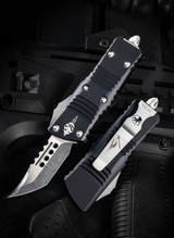 Microtech Mini Troodon Hellhound Black Aluminum Body w/ Stonewashed Plain Edge Blade (1.99”) 819-10S
