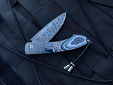 William Henry B12 “Rad” Folder Chad Nichols X Out Damascus Body w/ Fordite Inlay and Hornet’s Nest Damascus Blade (3.06”)