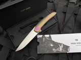 Hog House Knives Model T Bronzed Titanium Body w/ Violet Anodized Titanium Hardware and Blasted RWL-34 Blade (3.36”)