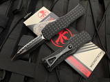 Microtech Hera D/E Frag Pattern Black Aluminum Body w/ Black Tactical Full Serrated Blade (3”) 702-3TFRS