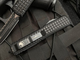 Microtech Ultratech D/E Signature Series Frag Pattern Black Aluminum Body w/ Black Full Serrated Blade (3.4") 122-3TFRS