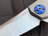 CONSIGNMENT ZT 0456 Sinkevich Flipper Titanium Body w/ Blue Anodized Accents and 20CV Satin Plain Edge Blade (3.25") 0456