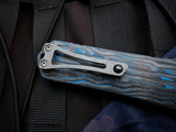 PRE-OWNED Heretic Knives Manticore X Recurve Blue Camo Carbon Clipside/Black Aluminum Body w/ Battleworn Plain Edge Blade (3.7"