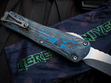 PRE-OWNED Heretic Knives Manticore X Recurve Blue Camo Carbon Clipside/Black Aluminum Body w/ Battleworn Plain Edge Blade (3.7"