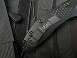 PRE-OWNED Microtech Stitch Auto Black Tactical Body w/ Full Serrated Black Tactical Blade (3.75") 169-3T