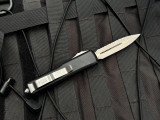CONSIGNMENT Microtech UTX-85 D/E Black Aluminum Body w/ Bronzed Full Serrated Blade (3.1") 232-15