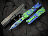 Microtech Combat Troodon D/E Green Mamba/PW Blue and Black Paint Splatter Aluminum Body w/ M390Mk Plain Edge Blade (3.8") 1142-1GMPWBKSPLS
