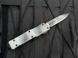 CONSIGNMENT Microtech Combat Troodon D/E Sand Trooper Edition Deep Engraved Aluminum Body w/ Full Serrated Blade (3.4") 142-3SAD