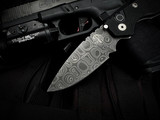 PRE-OWNED Pro-Tech Strider SNG Auto Folder Black G10 and Titanium Body w/ Chad Nichols Damascus Plain Edge Blade (3.5")