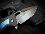 Heretic Knives Custom Medusa Manual Folder Entropic Anodized Titanium Inlaid Carbon Fiber Body w/ Elmax Hand Ground DLC Tanto Plain Edge Blade (3")