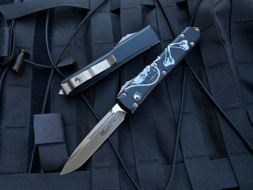 Microtech Ultratech S/E Deathcard Edition Aluminum Body w/ Bronzed Apocalyptic Plain Edge Blade (3.4”) 121-13DCS