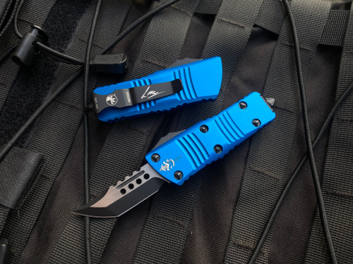 Microtech Mini Troodon Hellhound Blue Aluminum Body w/ Two Tone Black Plain Edge Blade (1.99") 819-1BLS