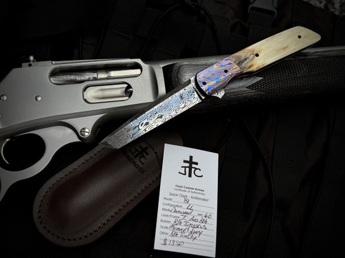 Jason Clark Model 81 Custom Folder Anodized Black Titanium Frame, Mammoth Ivory Scales, and Black Timascus Bolster w/ Damasteel Plain Edge Blade