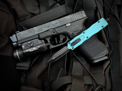 PRE-OWNED Microtech Dirac D/E Cyan Aluminum Body w/ M390MK Black Plain Edge Blade (2.92") 225-1CN