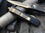 Microtech UTX-85 D/E Black Aluminum Body w/ Bronzed Full Serrated Blade (3.11”) 232-15